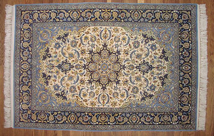 This superb Esfahan rug is woven at an incredible 600 knots per square inch with 100% soft kurk wool pile on a silk foundation.