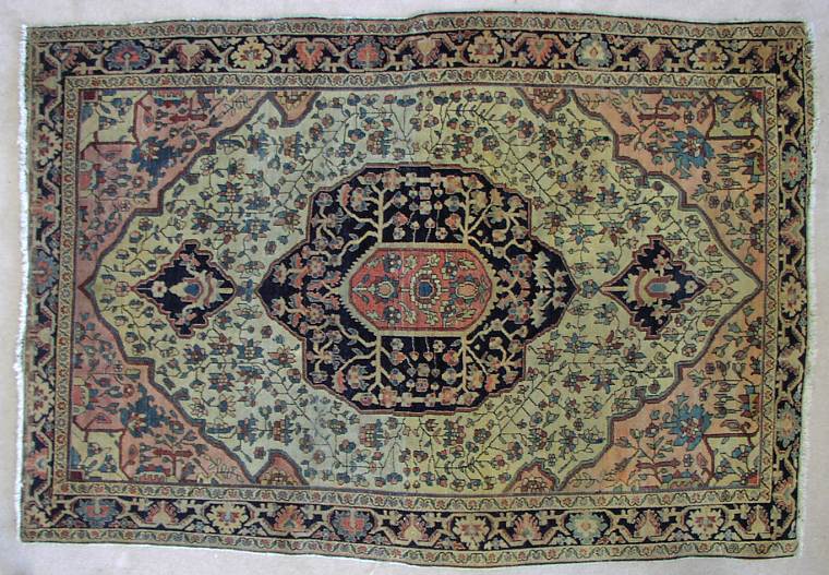 Another fine old Ferahan Sarouk dates to the late 19th Century. Acquired from an estate, it is soft and supple and has lovely antique warm colors