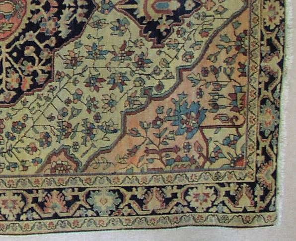 This is a shot of the corner of the rug showing the medallion and corner design with borders